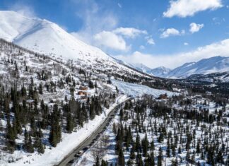 After massive avalanche, upper Hiland Road in Eagle River not likely to be clear for several days avalanche covers road